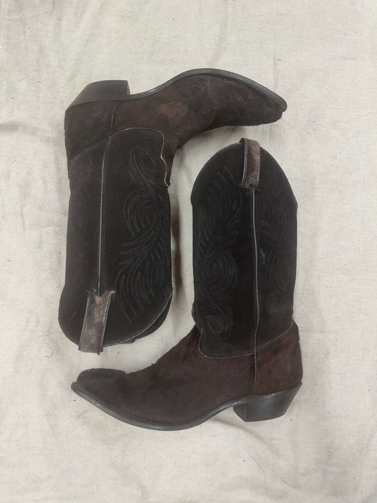 Vintage black and brown cowboy boots