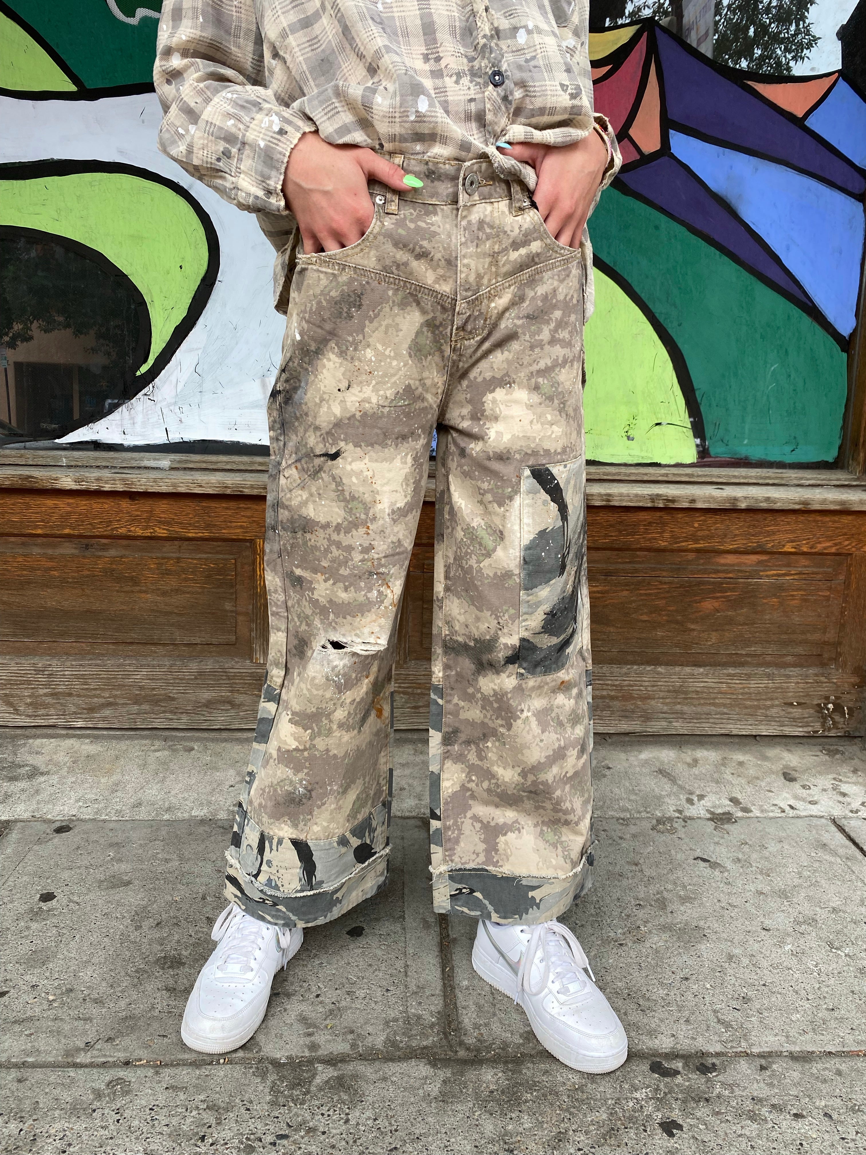 Camo pants with store patches